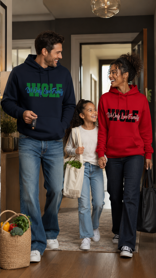 Family of three walking through a home, wearing matching 'WOLF' hoodies.