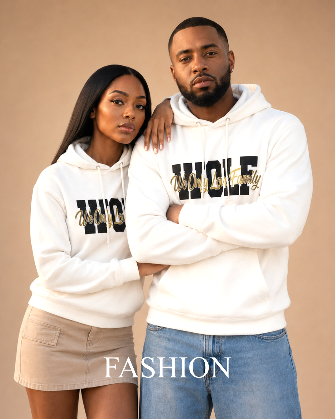 Couple wearing matching white hoodies from the WOLF Collection by Royal Reigns Design.